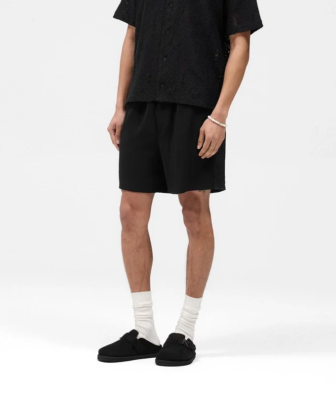 Shorts mit gestrickten Einsätzen Shorts mit gestrickten Einsätzen