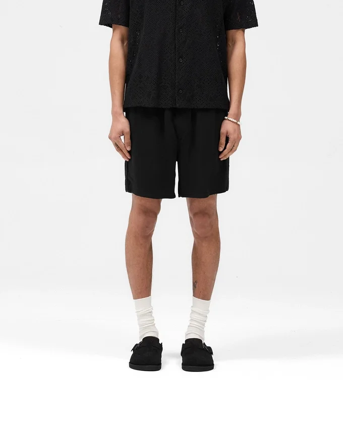 Shorts mit gestrickten Einsätzen Shorts mit gestrickten Einsätzen
