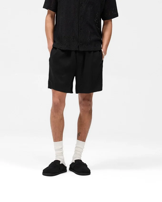 Shorts mit gestrickten Einsätzen Shorts mit gestrickten Einsätzen