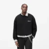 Zeilagiger Pullover mit Schriftzug